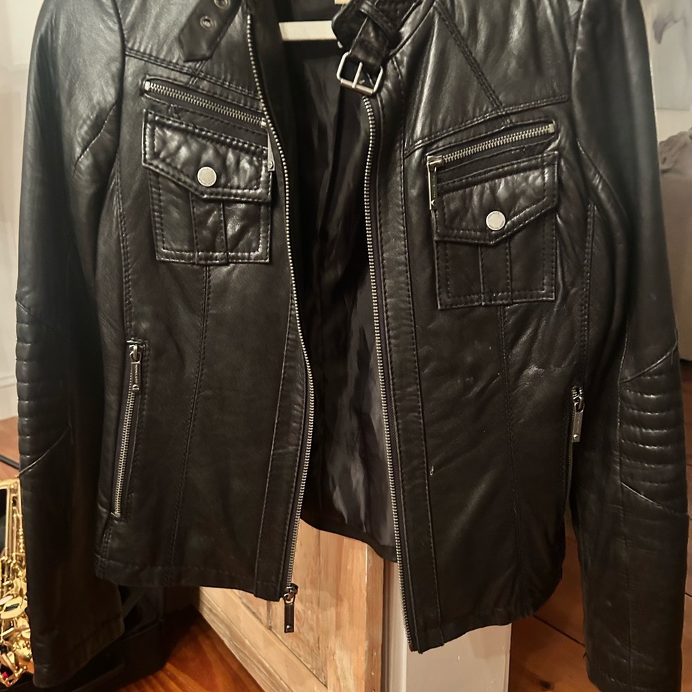 Black leather jacket- only wore a few times. Perfect condition.